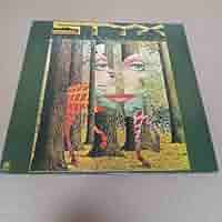 Amazon.com: The Grand Illusion[LP]: CDs & Vinyl